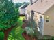 Backyard featuring well-maintained lawn, privacy landscaping and tidy mulch beds at 2694 Dawning Day Dr, Dacula, GA 30019