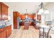 Modern kitchen with stainless steel appliances, granite countertops, and a breakfast nook at 2694 Dawning Day Dr, Dacula, GA 30019
