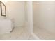 Bathroom with white subway tile shower, glass door, white vanity, and tile flooring at 702 Dodd Ln # 159, Buford, GA 30518