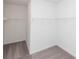 A walk-in closet features wire shelving for optimal organization at 702 Dodd Ln # 159, Buford, GA 30518