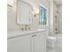 Bathroom featuring a white vanity, quartz countertops, modern fixtures, and a tub and shower at 100 Maison Ct, Roswell, GA 30076