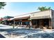 Downtown Canton Street with storefronts and street parking at 100 Maison Ct, Roswell, GA 30076