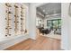 Stylish open-concept living space with wine storage and sliding glass doors to the backyard at 100 Maison Ct, Roswell, GA 30076