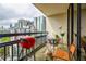 Relax on this cozy balcony with views of the Atlanta skyline and enjoy outdoor dining and grilling at 1130 Piedmont Ne Ave # 1407, Atlanta, GA 30309