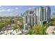Expansive city view showcasing nearby high-rise condos and towering buildings against a clear sky at 1130 Piedmont Ne Ave # 1407, Atlanta, GA 30309