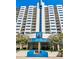 High-rise condo building with numerous balconies and modern architecture, located at Ansley Above the Park at 1130 Piedmont Ne Ave # 1407, Atlanta, GA 30309