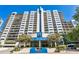 Beautiful high rise condo building with lovely landscaping and sleek architectural design at 1130 Piedmont Ne Ave # 1407, Atlanta, GA 30309