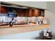 Stylish kitchen featuring stainless steel appliances and a breakfast bar at 1130 Piedmont Ne Ave # 1407, Atlanta, GA 30309