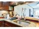 Bright kitchen showcasing stone countertops and stainless steel fixtures at 1130 Piedmont Ne Ave # 1407, Atlanta, GA 30309