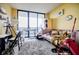 Cozy living room with large windows offering plenty of natural light and city views at 1130 Piedmont Ne Ave # 1407, Atlanta, GA 30309