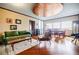 Cozy living room with hardwood floors, comfortable seating, and a unique copper ceiling detail at 1130 Piedmont Ne Ave # 1407, Atlanta, GA 30309