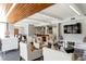 Modern lounge area with comfortable seating, TV, and wood ceiling at 1130 Piedmont Ne Ave # 1407, Atlanta, GA 30309