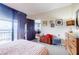 The spacious main bedroom flows seamlessly to the balcony and an en suite bath with checkered tile at 1130 Piedmont Ne Ave # 1407, Atlanta, GA 30309