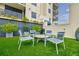 Inviting rooftop terrace with artificial turf, contemporary seating, and lush green landscaping at 1130 Piedmont Ne Ave # 1407, Atlanta, GA 30309