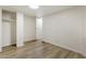 Bedroom with wood-look floors and a closet for storage at 3541 Hutcheson Ferry Rd, Whitesburg, GA 30185