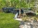 Exterior view of home featuring a metal carport and front porch entrance at 3541 Hutcheson Ferry Rd, Whitesburg, GA 30185