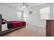 Bedroom with a ceiling fan, window, carpet flooring and side view of the dresser at 4143 Halton Rd, Duluth, GA 30097