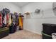 Walk-in closet features wire shelving, and clothing racks for ample storage at 4143 Halton Rd, Duluth, GA 30097