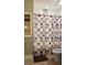 Bathroom featuring white tiled shower and tub with a vanity for storage at 1804 Huntingdon Chase # 1804, Atlanta, GA 30350
