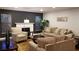 Comfortable living room features a fireplace, natural light, and stylish furnishings at 1804 Huntingdon Chase # 1804, Atlanta, GA 30350