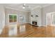 Cozy living room with a sliding glass door providing access to the deck and showcasing the back yard at 2060 Pate Ridge Dr, Loganville, GA 30052