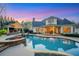Stunning backyard with a pool, cabana, hot tub and meticulous landscaping at 2305 Whiting Bay Cts, Kennesaw, GA 30152