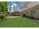 Large backyard with stone and siding home and basketball court at 2305 Whiting Bay Cts, Kennesaw, GA 30152