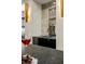 Wet bar with granite countertops, a sink, gold hardware, and a wine glass in view at 2305 Whiting Bay Cts, Kennesaw, GA 30152