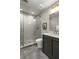 Modern bathroom featuring a glass-enclosed shower and stylish vanity at 2305 Whiting Bay Cts, Kennesaw, GA 30152