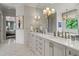 Luxurious bathroom with double vanity, marble countertops and elegant fixtures at 2305 Whiting Bay Cts, Kennesaw, GA 30152