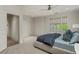 Bright bedroom features plush carpet, recessed lighting, and neutral paint palette at 2305 Whiting Bay Cts, Kennesaw, GA 30152