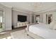 Serene bedroom with soft lighting, modern furnishings, and an en-suite bathroom at 2305 Whiting Bay Cts, Kennesaw, GA 30152