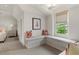 Charming bedroom with a built-in window seat and storage that offers a cozy reading nook at 2305 Whiting Bay Cts, Kennesaw, GA 30152