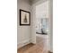 View into a beautifully decorated bedroom with a chandelier and neutral color palette at 2305 Whiting Bay Cts, Kennesaw, GA 30152