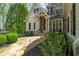 Stunning home with stone accents, arched entryway, manicured landscaping at 2305 Whiting Bay Cts, Kennesaw, GA 30152