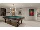 Game room featuring a pool table, contemporary lighting, and modern decor at 2305 Whiting Bay Cts, Kennesaw, GA 30152