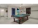 Game room featuring a pool table, contemporary lighting, and modern decor at 2305 Whiting Bay Cts, Kennesaw, GA 30152
