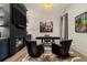 Bright home office with a fireplace, custom shelving, and comfortable seating at 2305 Whiting Bay Cts, Kennesaw, GA 30152