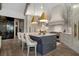 Gourmet kitchen with a large island, marble countertops, and modern appliances at 2305 Whiting Bay Cts, Kennesaw, GA 30152