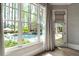 A beautiful view of the pool from a window in the home at 2305 Whiting Bay Cts, Kennesaw, GA 30152