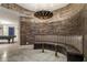 Unique seating area with a curved banquette, accent lighting and decorative wall at 2305 Whiting Bay Cts, Kennesaw, GA 30152