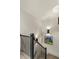 Elegant staircase with modern lighting and dark metal railing at 2305 Whiting Bay Cts, Kennesaw, GA 30152