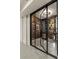 Wine cellar featuring climate control, custom storage for wine bottles, and stylish lighting at 2305 Whiting Bay Cts, Kennesaw, GA 30152