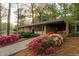 Lovely home with a brick facade, sidewalk, and beautiful flowerbeds in the front yard create an inviting curb appeal at 2744 Hunting Hill Ln, Decatur, GA 30033