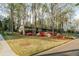 Beautiful home with a lush front yard adorned with colorful flowers, creating a welcoming curb appeal at 2744 Hunting Hill Ln, Decatur, GA 30033