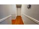 Long hallway featuring hardwood floors, crown molding, and neutral paint at 2744 Hunting Hill Ln, Decatur, GA 30033
