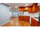 Modern kitchen featuring stainless steel appliances, ample cabinetry, and white countertops with a view to the living area at 2744 Hunting Hill Ln, Decatur, GA 30033