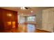 Open living space featuring hardwood floors, lots of natural light, and view to another room in a seamless layout at 2744 Hunting Hill Ln, Decatur, GA 30033