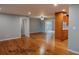 Spacious living area with hardwood floors, neutral color scheme, and seamless transition to other rooms at 2744 Hunting Hill Ln, Decatur, GA 30033