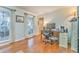 Office space features hardwood floors, natural light, and a view of the outdoors at 825 Clarion Way, Lawrenceville, GA 30044